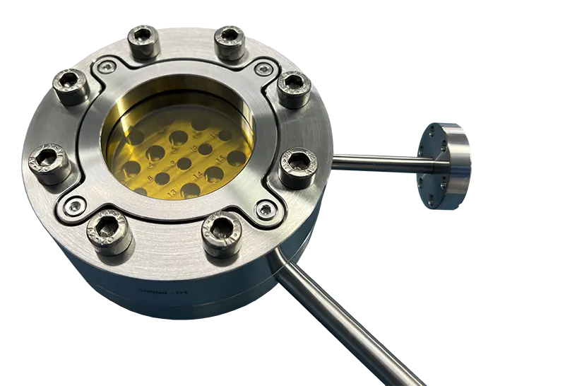 IR-window UHV cells for stepped-heating gas sampling